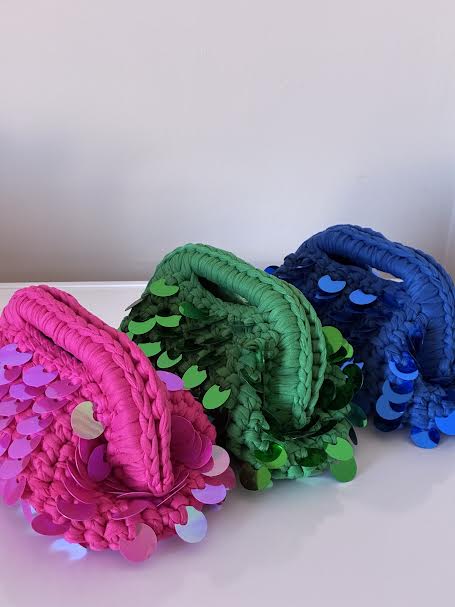 mini clutch bag con paillettes