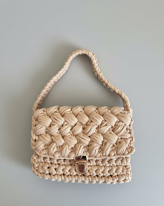 borsa tracolla in punto “puff”